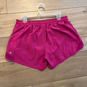 Lululemon Hotty Hot low rise. Size 14. Ripened raspberry. Lined, drawstring.
